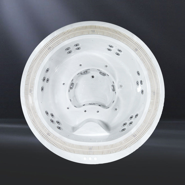 A top view image of a white commercial   hot tub with multiple jets.