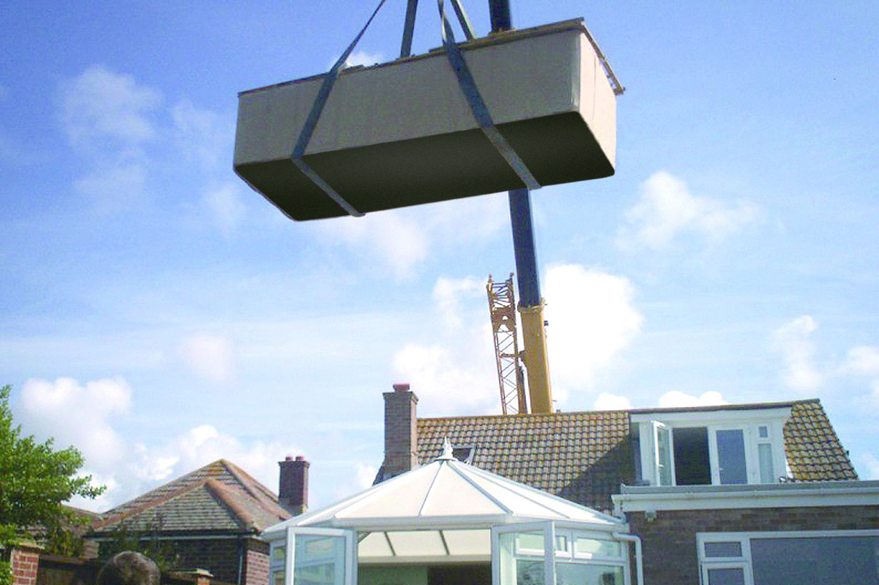 crane moving a swim spa