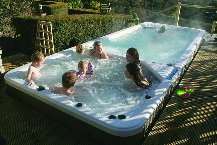family enjoying the swim spa