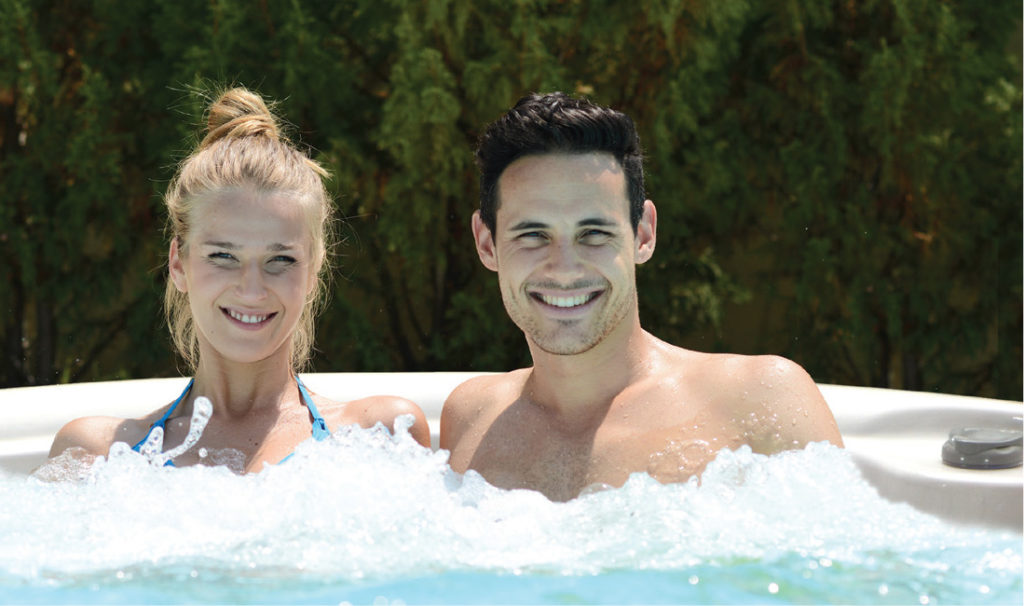 enjoying the hot tub entertainment system